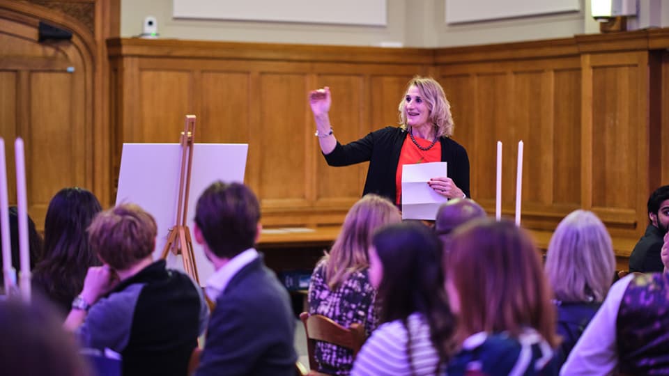 Professor Jan Godsell introduces the Distinguished Alumni Awards to a room of guests.